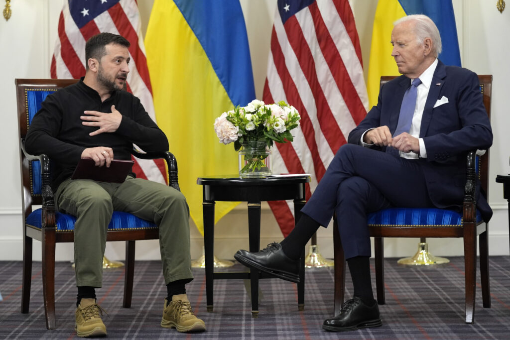 U.S. President Joe Biden meets with Ukrainian President Volodymyr Zelenskyy in Paris, Friday, June 7, 2024. (AP Photo/Evan Vucci)