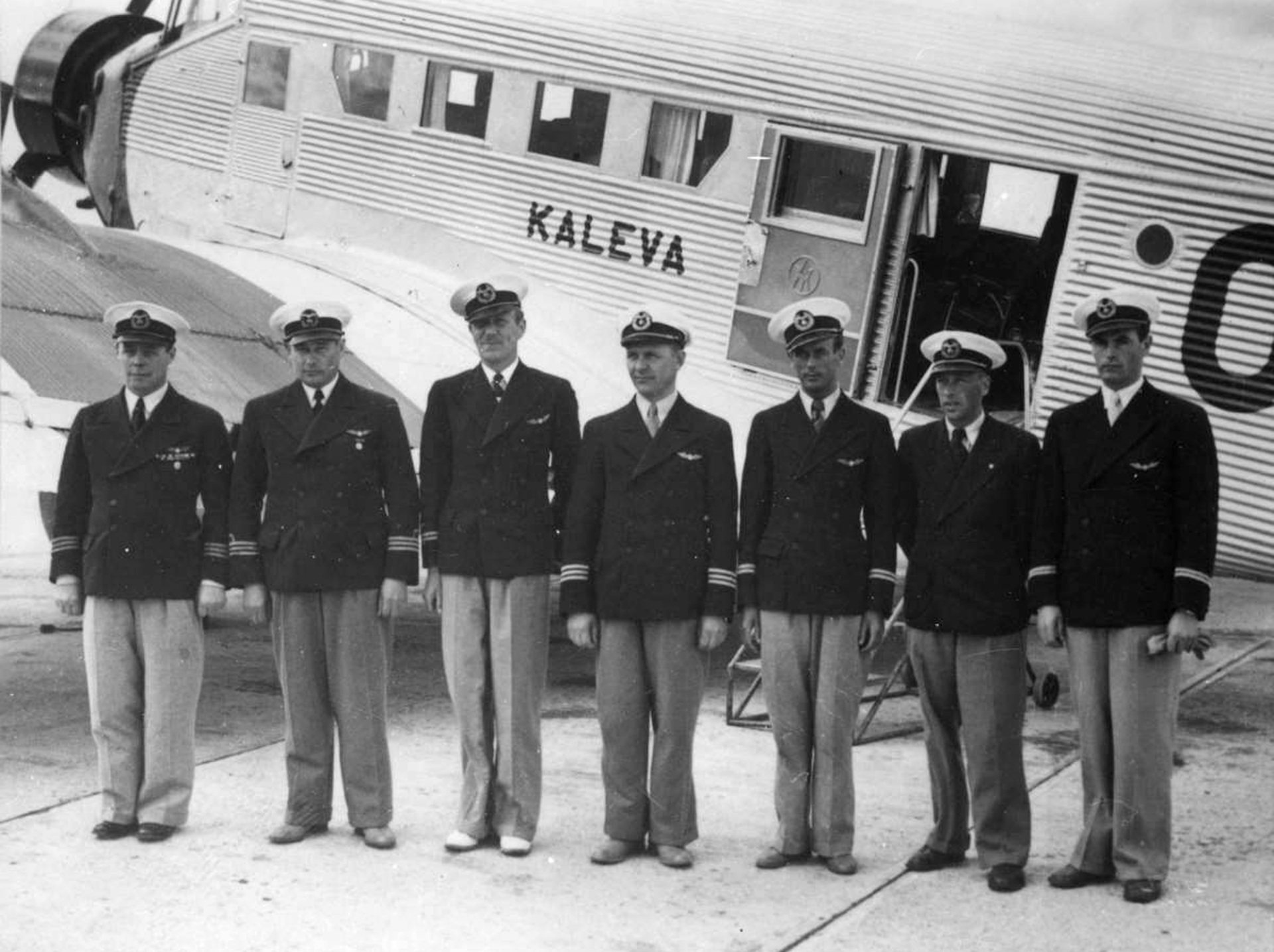 Crew a of the Junkers Ju 52 aircraft "Kaleva" by the Finnish airline Aero photographed in spring 1940. With U.S. and French diplomatic couriers aboard, the civilian plane was shot down over the Baltic Sea by Soviet bombers on June 14, 1940 just days before Moscow annexed the three Baltic states. Third from the left stands Bo von Willebrand who was the captain of "Kaleva" and perished in the crash. The mysterious case which claimed the lives of nine people is being solved after 84 years as an Estonian diving group has located the aircraft's wreckage off a tiny island close to Tallinn. (Finnish Aviation Museum via AP)