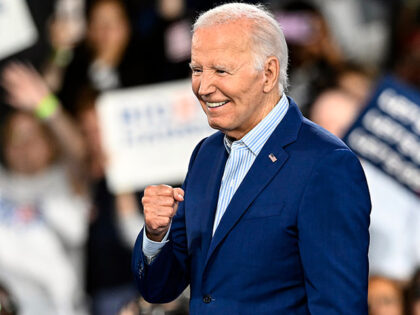 President Joe Biden reacts after speaking at a campaign rally in Raleigh, N.C., Friday, Ju