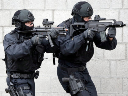 Police officers hold weapons during a training operation of the new BFE+ (Evidence and Arr