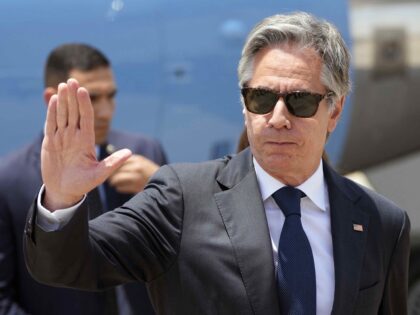US Secretary of State Antony Blinken gestures upon his arrival at Cairo airport, on June 1