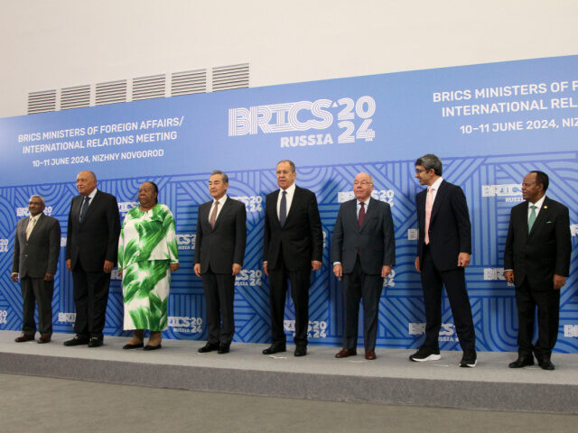 From left, India's BRICS Sherpa Dammu Ravi, Egypt's Foreign Ministers Sameh Shoukry, South