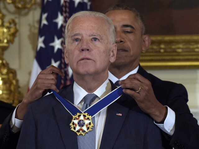 President Barack Obama presents Vice President Joe Biden with the Presidential Medal of Fr