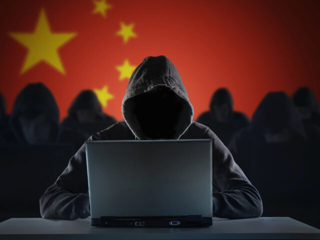 Many chinese hackers in troll farm. Privacy and security concept. - stock photo