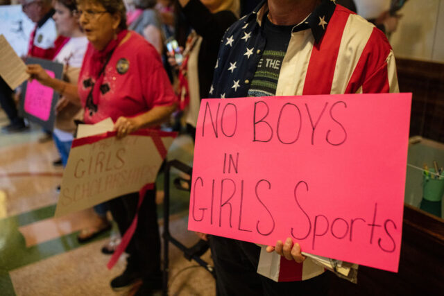 AUSTIN, TX - SEPTEMBER 20: Demonstrators supporting restrictions on transgender student at