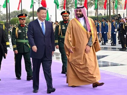 Chinese President Xi Jinping, who is paying a state visit to Saudi Arabia, attends a welco