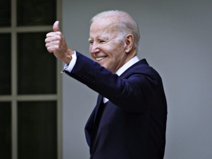 US President Joe Biden, waves back to the crowd during a National Small Business Week even