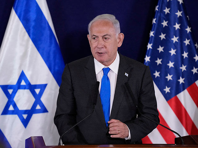 Israeli Prime Minister Benjamin Netanyahu gives statements to the media inside The Kirya,