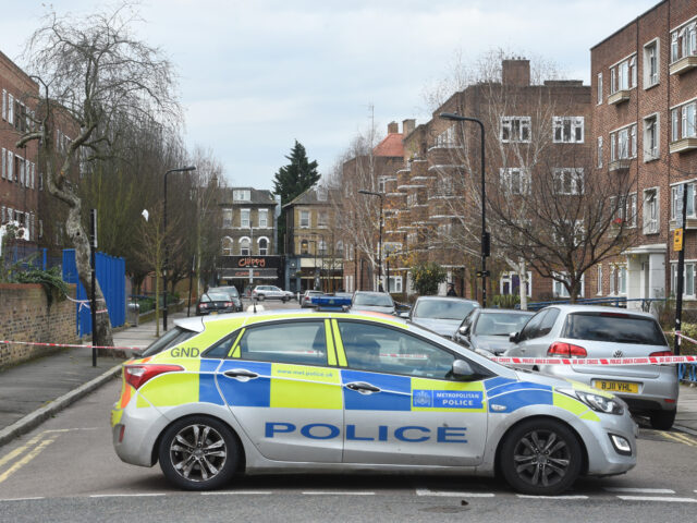 Police Car At Crime Scene In Marquis Road, London, England..A Murder Hunt Was Launched Tod