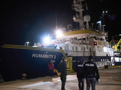 CROTONE, ITALY - 2024/03/04: Police seen walking in front of the rescue vessel. The rescue