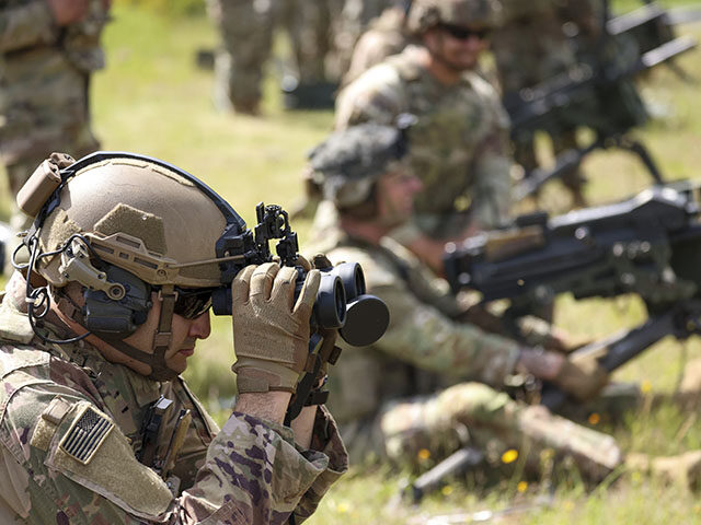 US Army soldiers fire Mk 19 grenade launchers at a live fire event during a heavy weapons