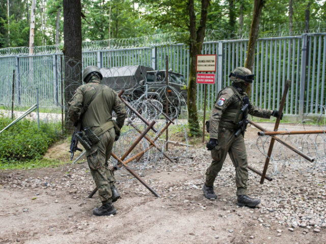 BIALOWIEZA FOREST, POLAND - 2024/06/03: Polish soldiers patrol the border with Belarus alo