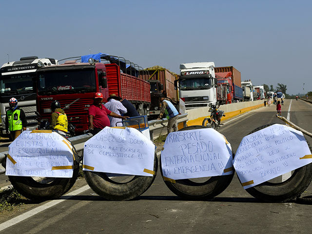 International cargo truckers block a highway connecting Santa Cruz to Cochabamba and La Pa