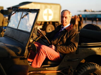 Leader of Reform UK Nigel Farage on Gold Beach in Arromanches in Normandy, France, to comm