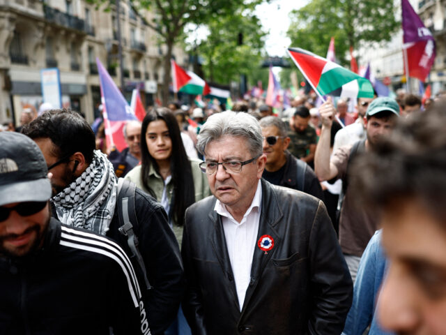 Founder of left-wing party La France Insoumise (LFI) Jean-Luc Melenchon walks during a dem