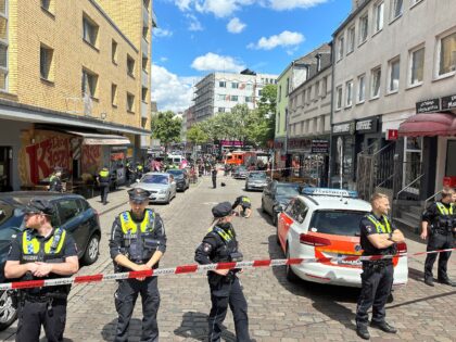 dpatop - 16 June 2024, Hamburg: Police cordon off an area near the Reeperbahn after an ope