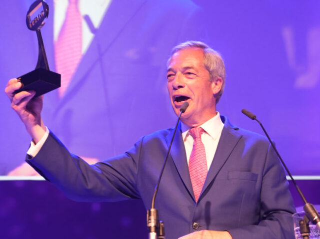 Nigel Farage with his award for Best News Presenter at the TRIC (The Television and Radio