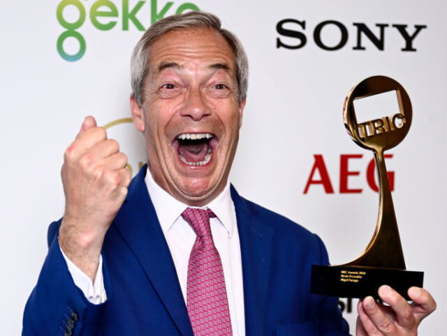 LONDON, ENGLAND - JUNE 25: Nigel Farage with the News Presenter Award at The TRIC Awards 2