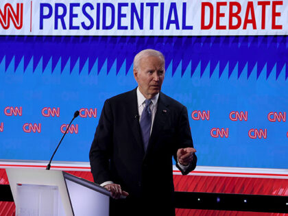 President Joe Biden walks off stage during the CNN Presidential Debate at the CNN Studios