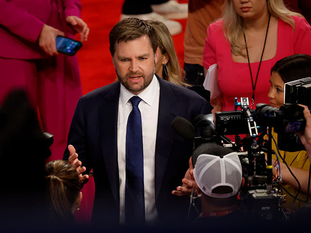 Sen. JD Vance (R-OH) speaks to reporters in the spin room following the CNN Presidential D