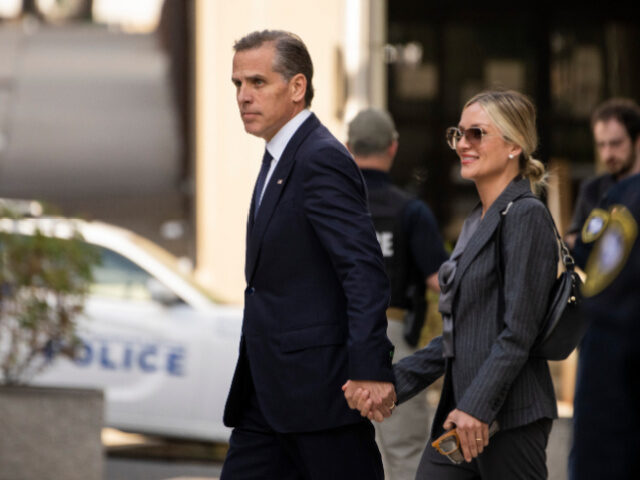 Hunter Biden, son of US President Joe Biden, left, and his wife Melissa Cohen Biden, right