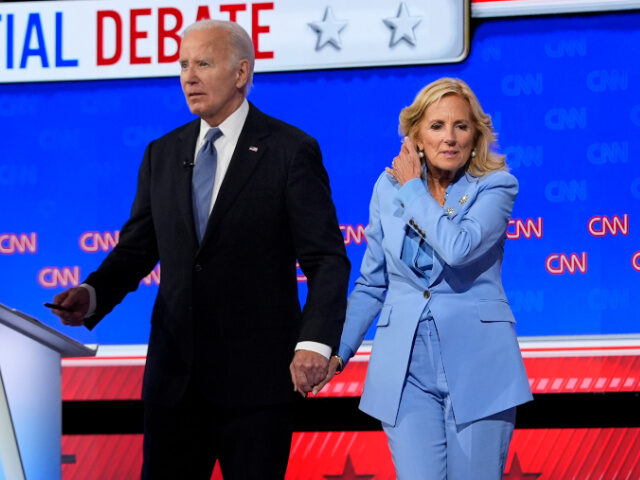 First lady Jill Biden, right, stands with President Joe Biden at the conclusion of a presi