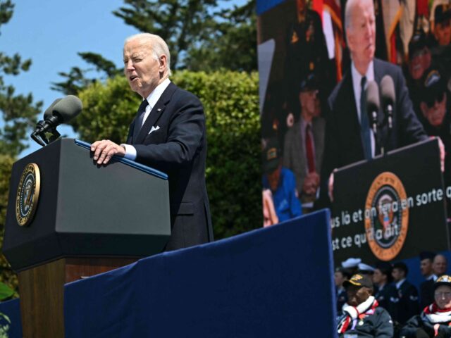 US President Joe Biden delivers a speech during the US ceremony marking the 80th anniversa