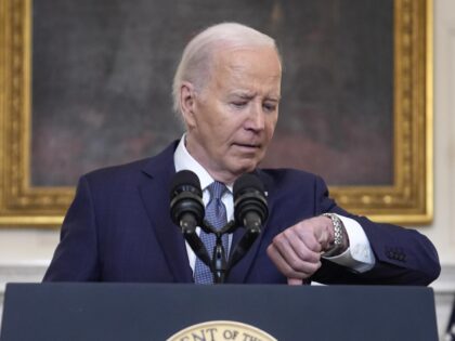 President Joe Biden checks his watch before delivering remarks on the verdict in former Pr