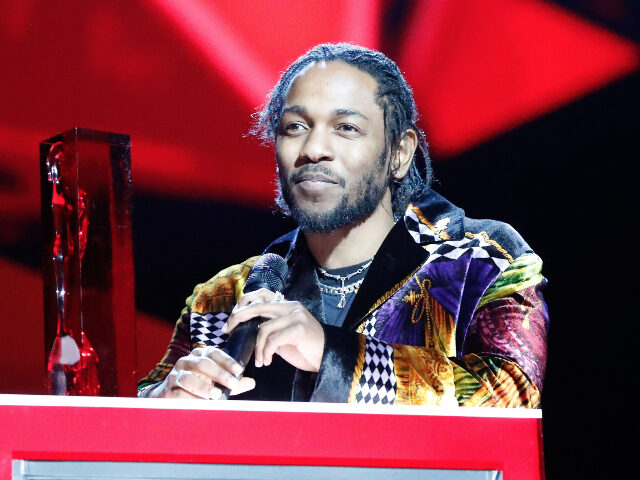 Kendrick Lamar accepts the International Male Solo Artist award during The BRIT Awards 201