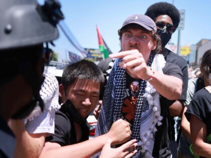 Los Angeles Police Department (LAPD) officers clash with anti-Israel protesters gathered o