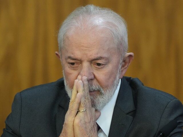 Brazil's President Luiz Inacio Lula da Silva attends a contract-signing ceremony betw