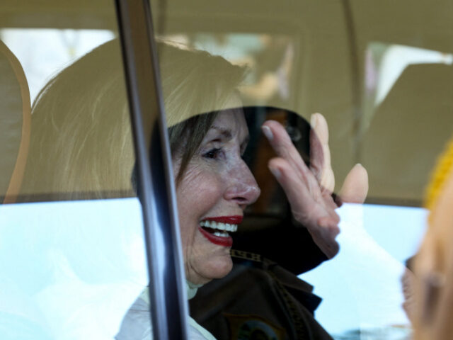 Nancy Pelosi, former Speaker of the U.S. House of Representatives waves to the crowd upon