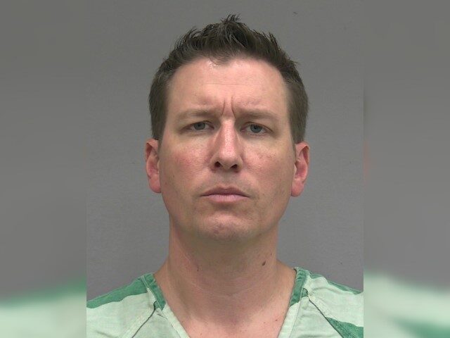 Never Trumper Joel Searby booking photo