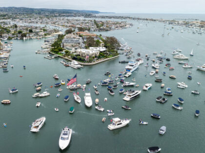 NEWPORT BEACH, CA - JUNE 08: Supporters turned out, even on boats, for Donald Trump's