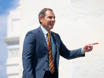 WASHINGTON - JUNE 14: Rep. John Curtis, R-Utah, walks up the House steps for votes in the