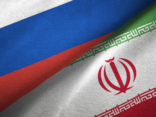 Iran and Russia two flags together realations textile cloth fabric texture - stock photo
