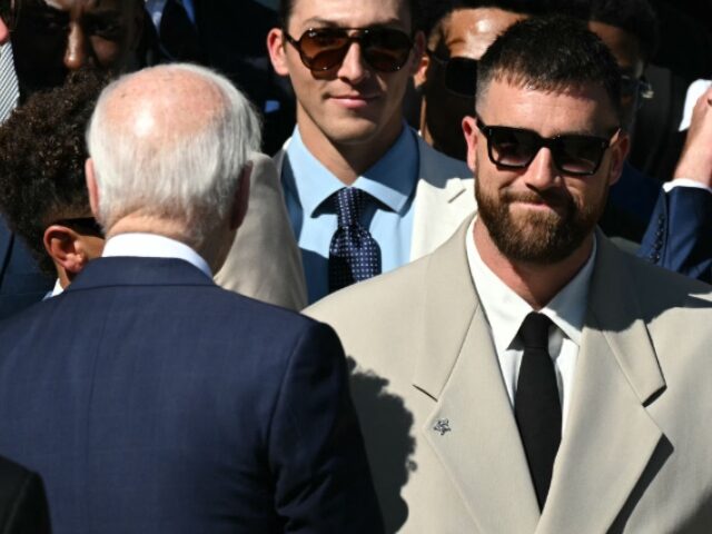 US President Joe Biden greets players including Kansas City Chiefs' tight end Travis