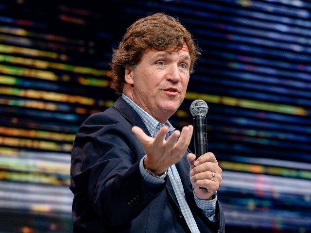 Tucker Carlson speaks during the 10X Growth Conference 2024 at The Diplomat Beach Resort o