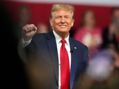 Republican presidential candidate former President Donald Trump smiles during a Fox News C