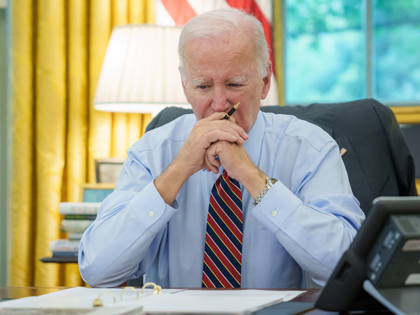 President Joe Biden participates in a phone call with Quint leaders Emmanuel Macron of Fra