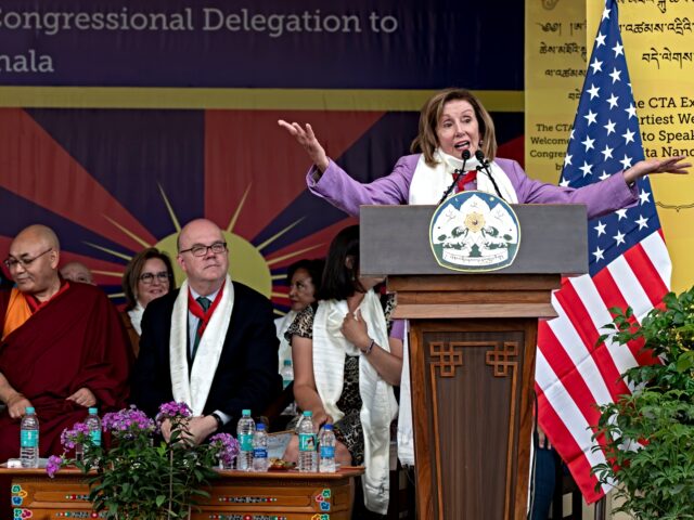 Democratic former House Speaker Nancy Pelosi gestures as she speaks at a public event duri