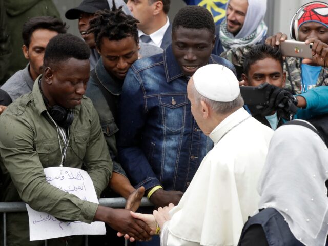 Pope Francis arrives at a regional migrant center to meet youths from Africa, in Bologna,
