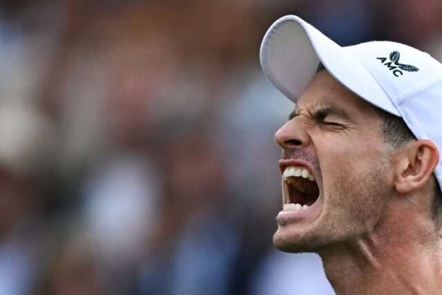 Andy Murray celebrates after winning his opening match at Queen's Club