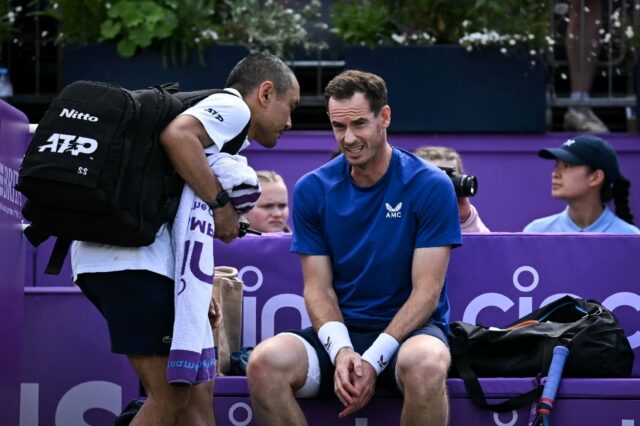 Andy Murray (R) was forced to retire against Jordan Thompson at Queen's after a medical ti