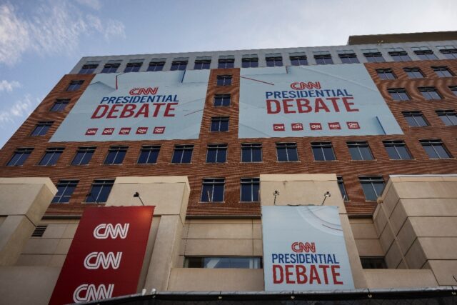 Banners outside of CNN studios ahead of the first presidential debate in Atlanta, Georgia