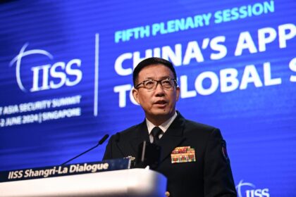 Chinese Defence Minister Dong Jun speaks Sunday at the 21st Shangri-La Dialogue summit in