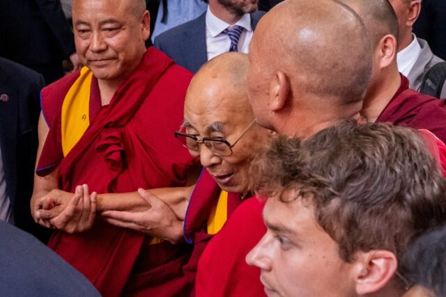 The Dalai Lama arrives at a hotel in New York, where he is scheduleld to undergo knee surg