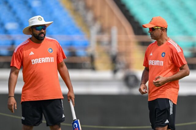 India's Rohit Sharma (L) and coach Rahul Dravid pictured together in February