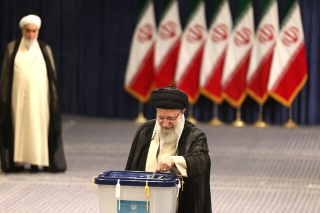 Iran's supreme leader Ayatollah Ali Khamenei, who holds ultimate political power, casts hi