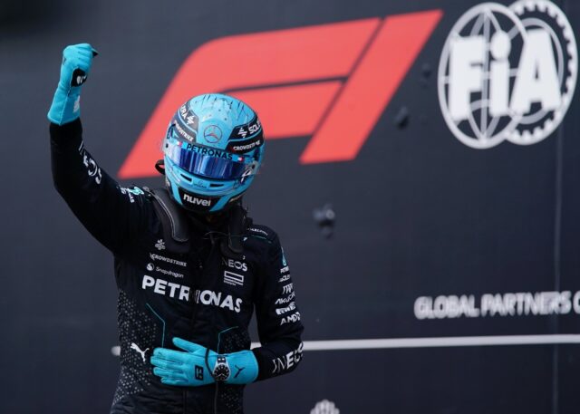 Mercedes' British driver George Russell celebrates winning pole for the Canada Grand Prix